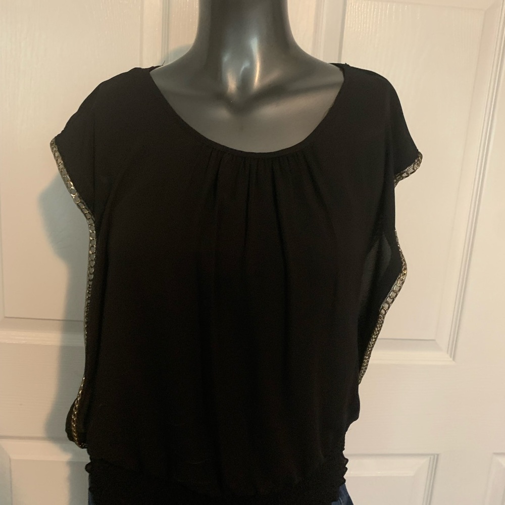 Black top with gold chain detail. New